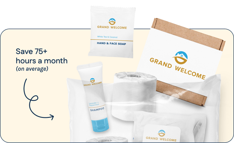 Grand Welcome travel-sized toiletries set with packaging on a light beige background
