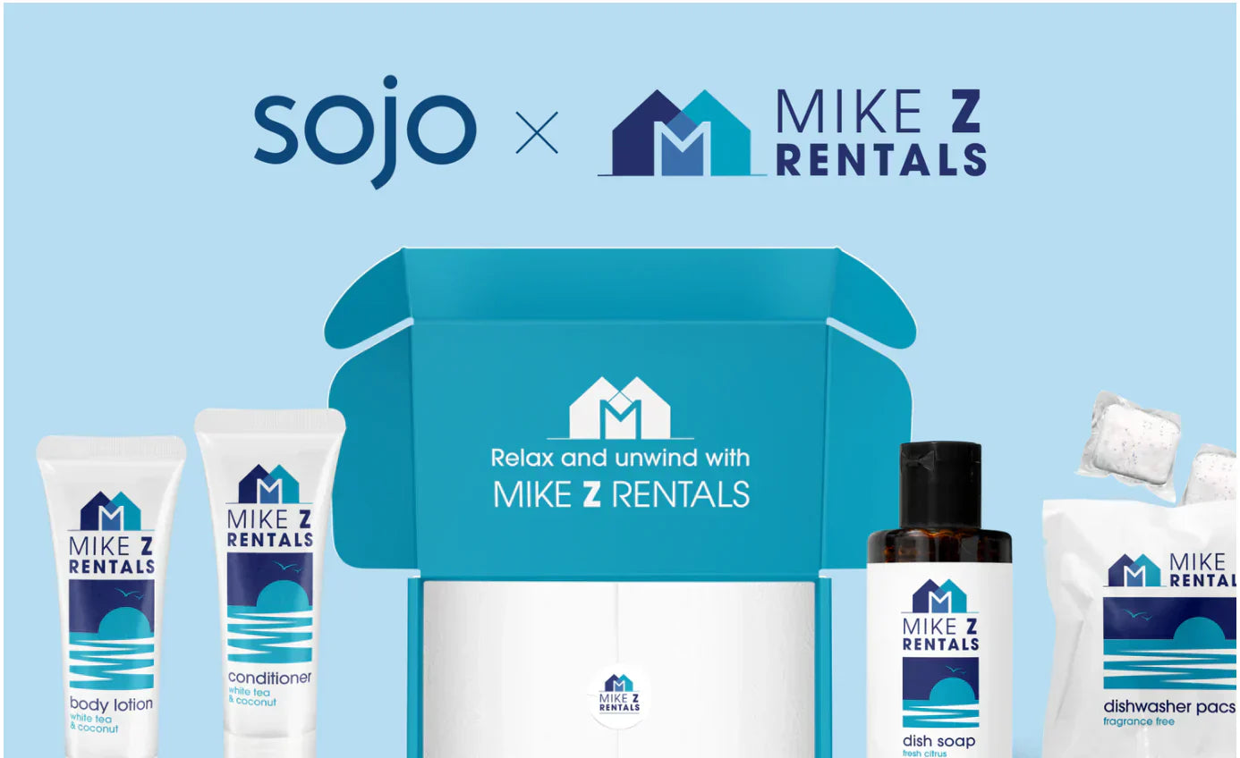 Mike Z Rentals amenity kit with toiletries and dishwasher pacs, Sojo collaboration branding.