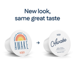 Two pods and k-cups of sojo's coffee Awake blend shown side by side with the text 'New look, same great taste.' The left pod is white with a colorful sunburst logo and the word 'AWAKE'; the right k-cup is a plain warm off-white with the word 'Awake' in dark blue script.