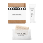 Full bath amenity essentials kit with shampoo and body bar soap in a box.