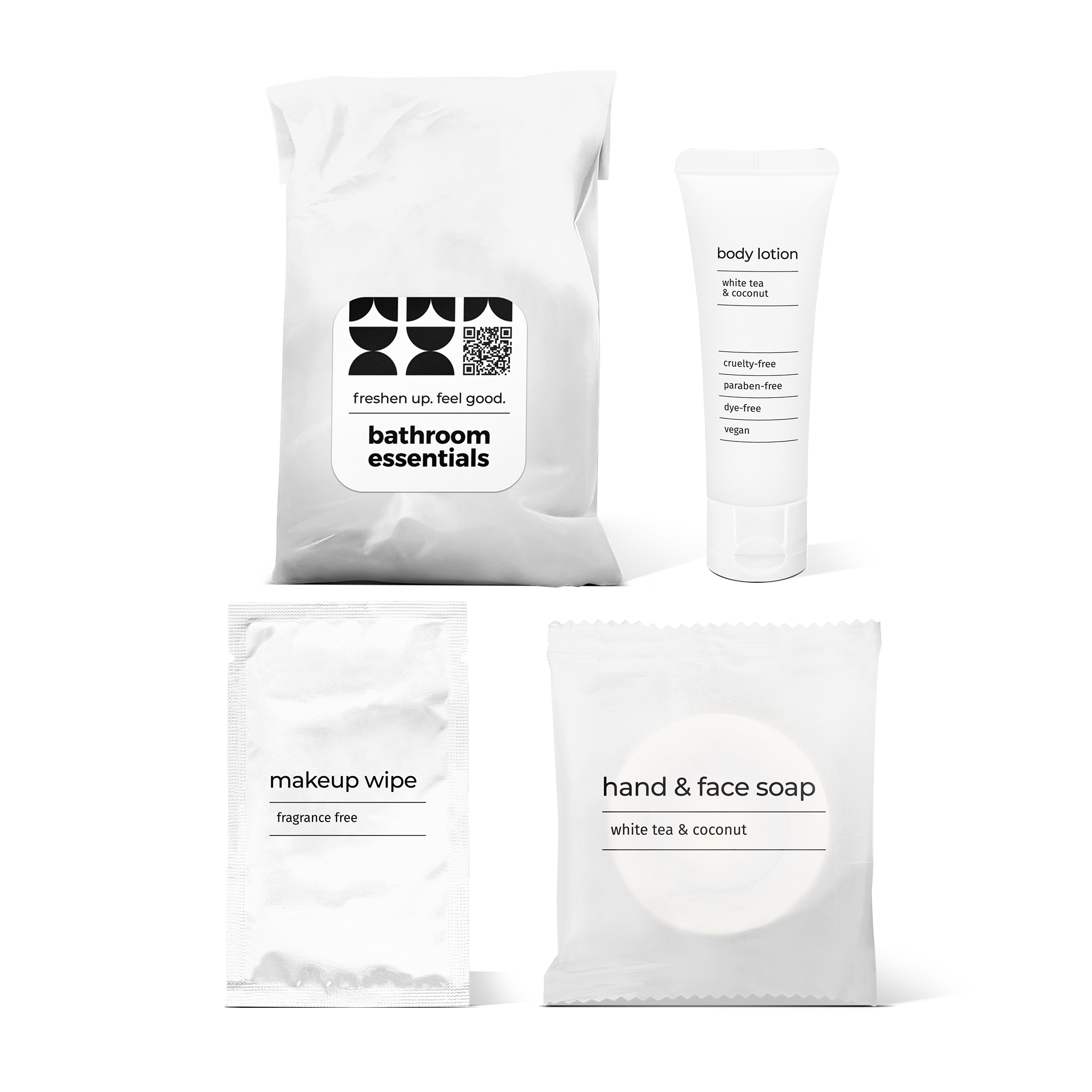 Luxury half bath amenity kit featuring hand and face soap, makeup wipe, and body lotion in a bag.
