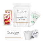 Casago coffee bundle with two Coffeemate powdered creamers, four sticks of granulated white sugar, two k-cups of sojo's Awake coffee blend, and a welcome card