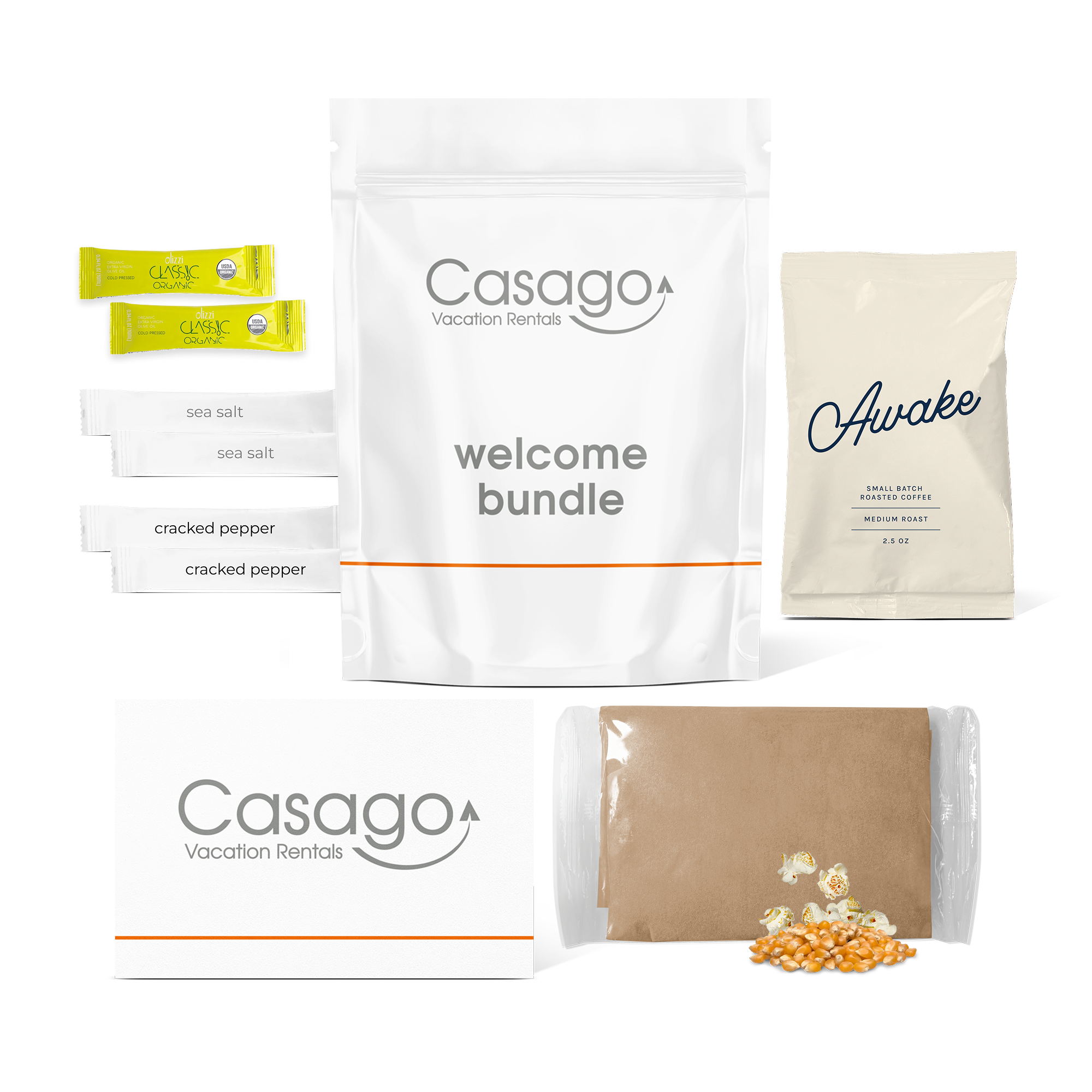 Casago welcome bundle with two olive oil sticks, two sea salt sticks, two cracked pepper sticks, one bag of sojo's Awake ground coffee blend, one bag of microwavable popcorn, and a Casago welcome card.