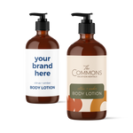Two amber refill bottles of body lotion with pump dispensers showing custom branded labels for vacation rentals