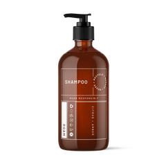 Amber refill bottle of shampoo with pump dispenser and citrus and amber label