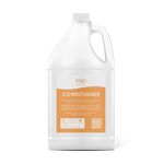 White and light orange refill gallon of conditioner