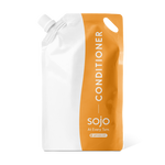 1 liter white and light orange refill pouch of conditioner