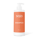 14oz White and orange refill bottle of shampoo with pump 