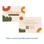 Branded welcome card reading "Unpack & Relax" with message about a complimentary stay bundle and a QR code for booking